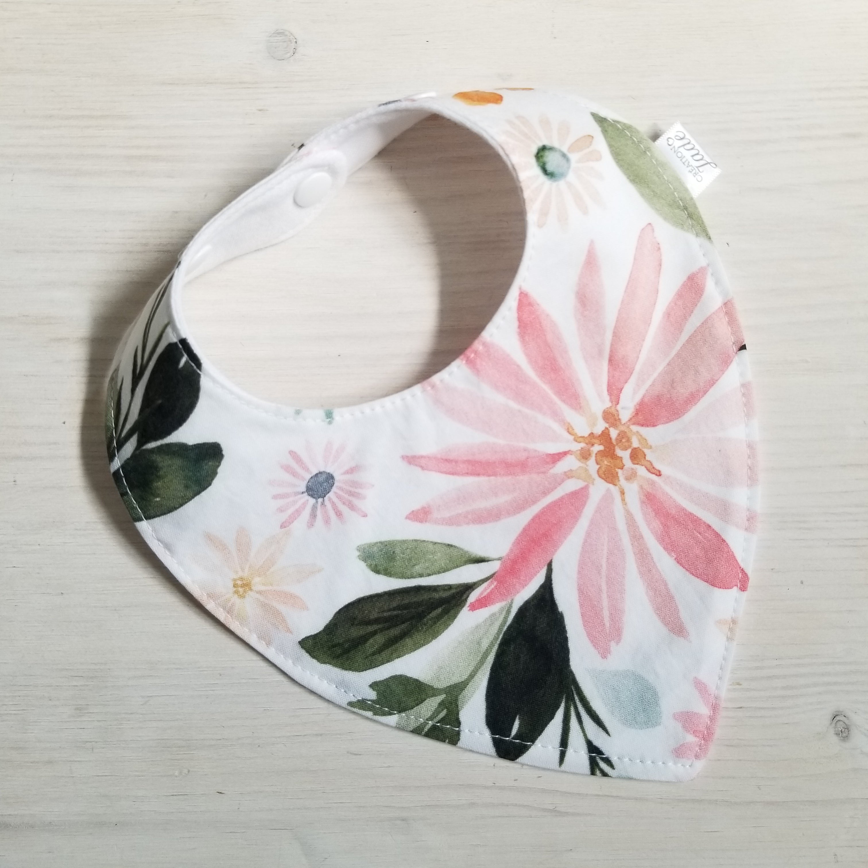 bavoir fleuri fille