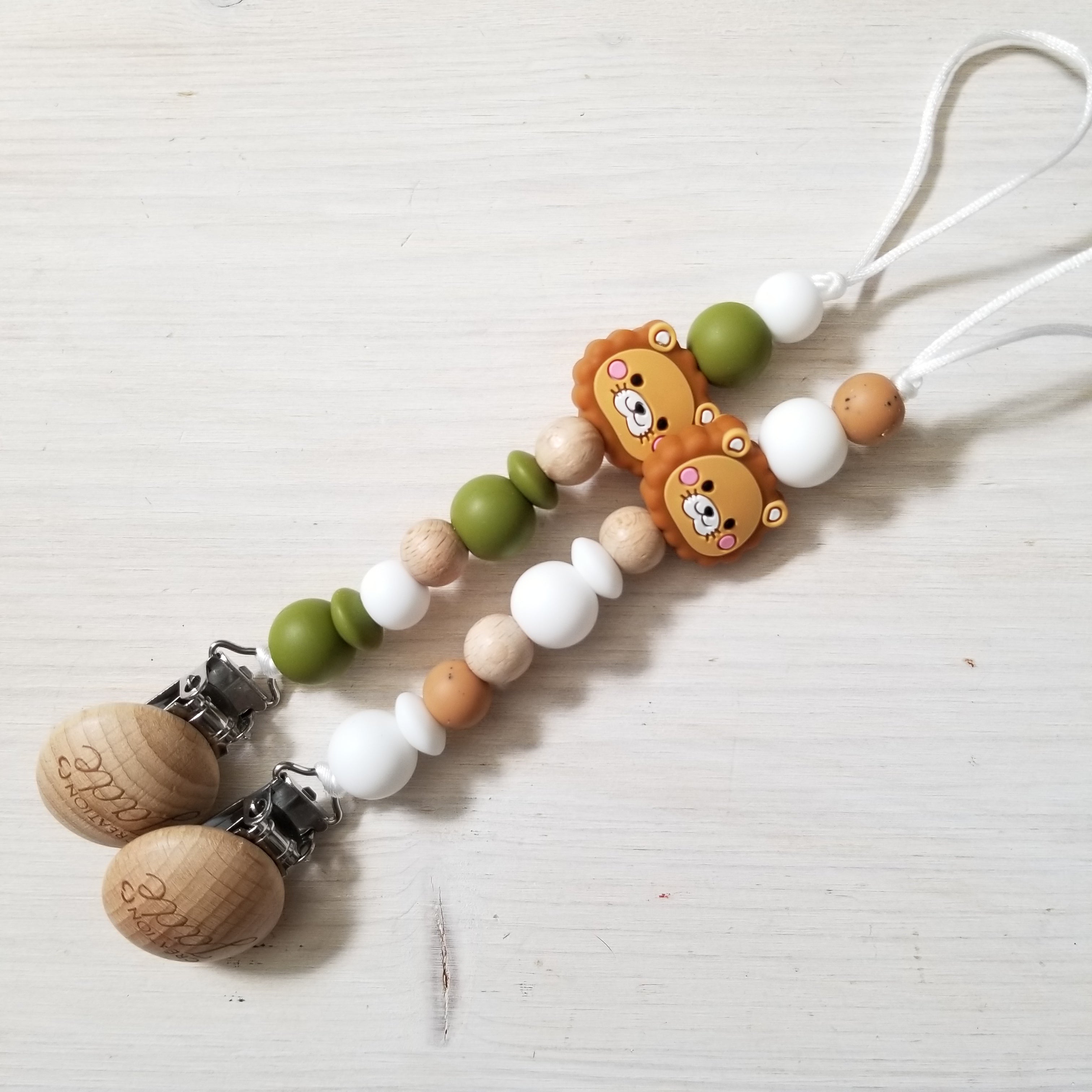 Nouveauté - Attache-suce Bois - Lion