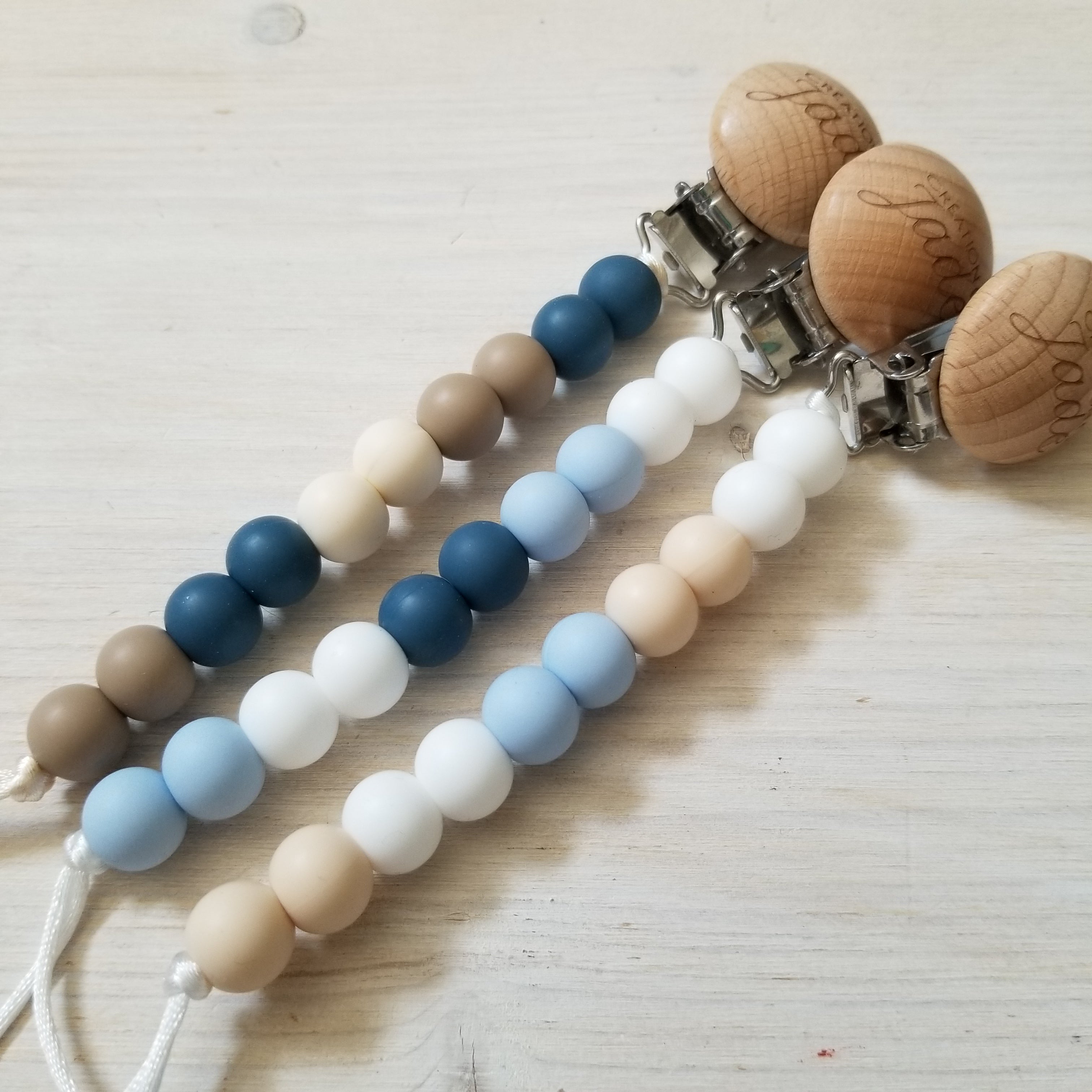 Nouveauté - Attache-suce Bois - Délicatesse Flanelle