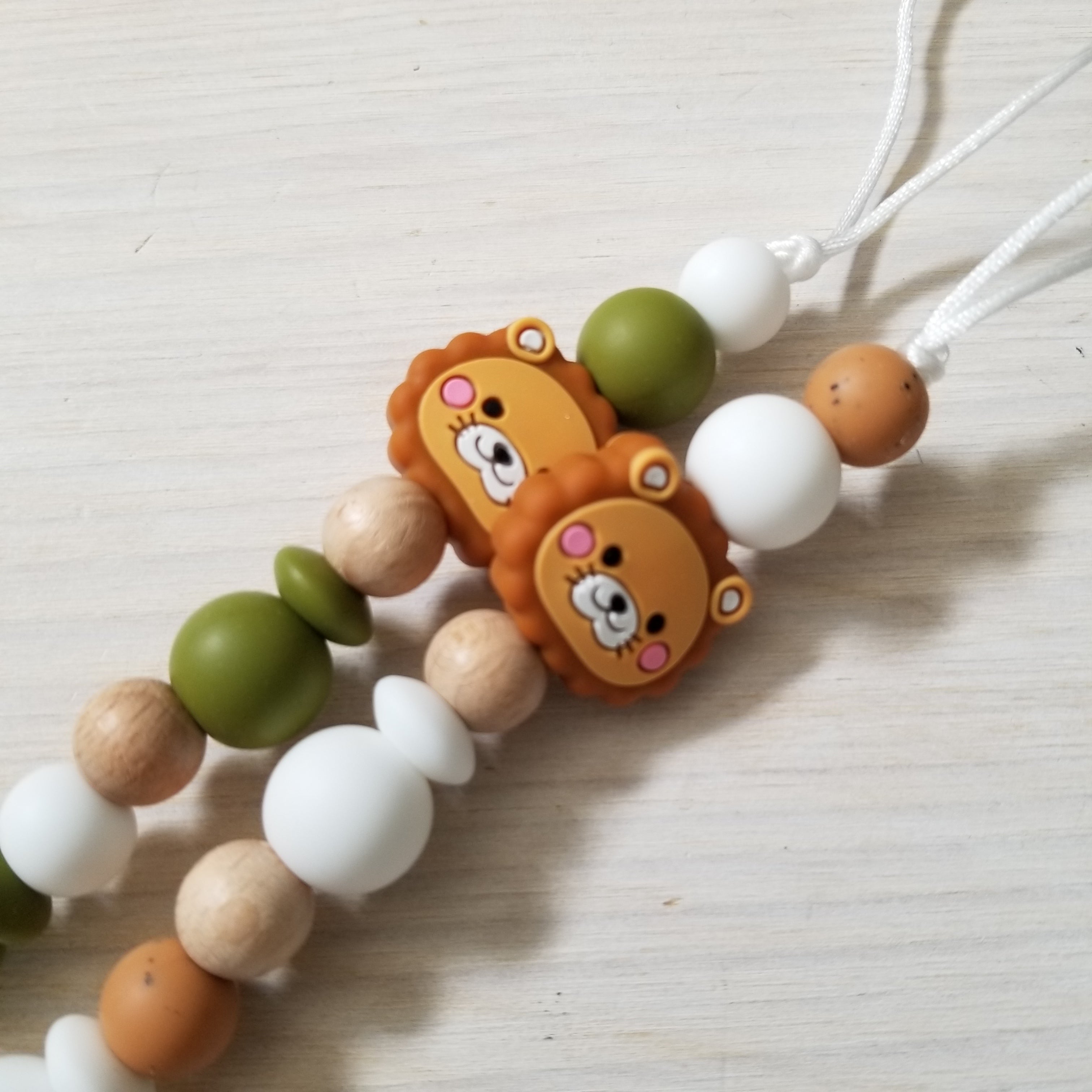 Nouveauté - Attache-suce Bois - Lion