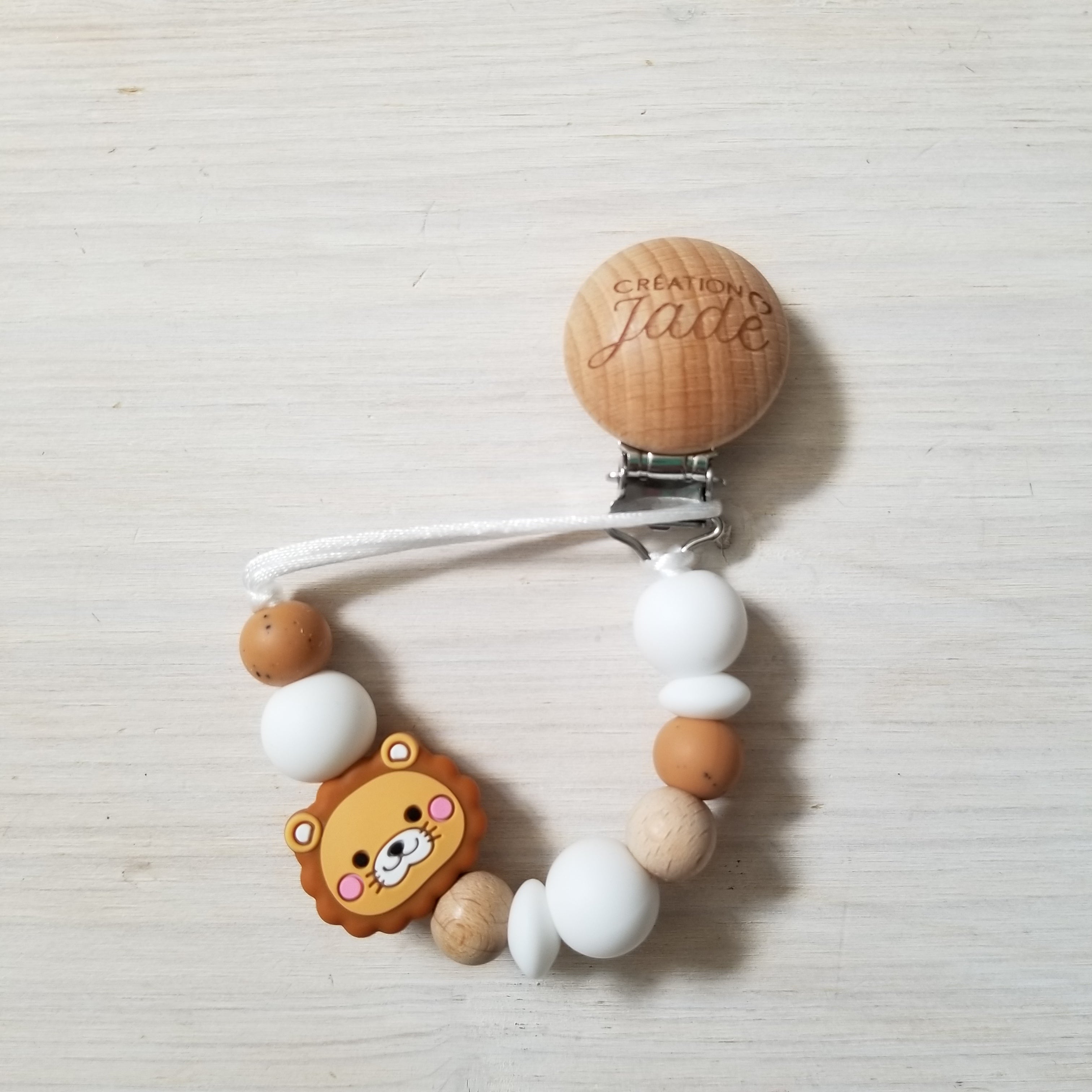 Nouveauté - Attache-suce Bois - Lion